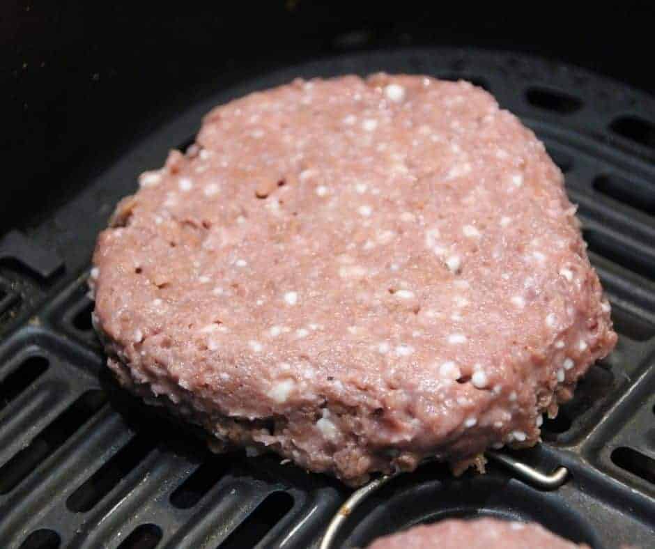 close up of a beyond burger cooking in this beyond burger air fryer recipe