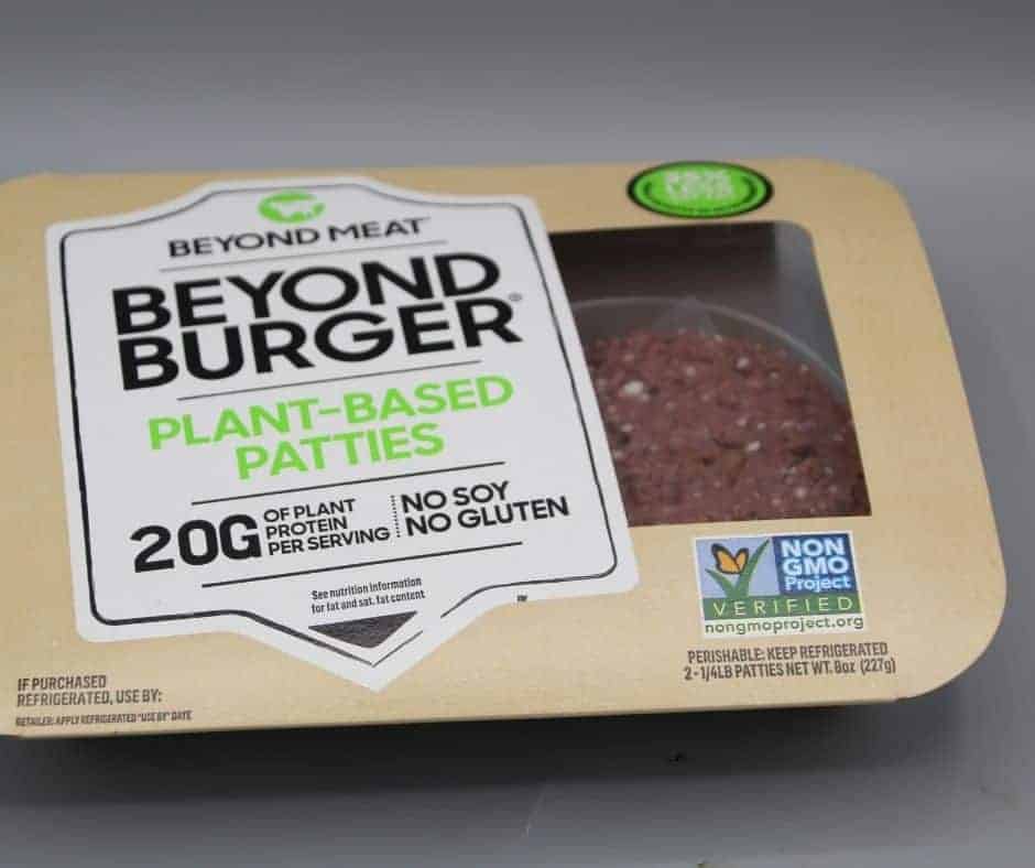 A package of uncooked BB plant-based patties for a Beyond Burger recipe. 