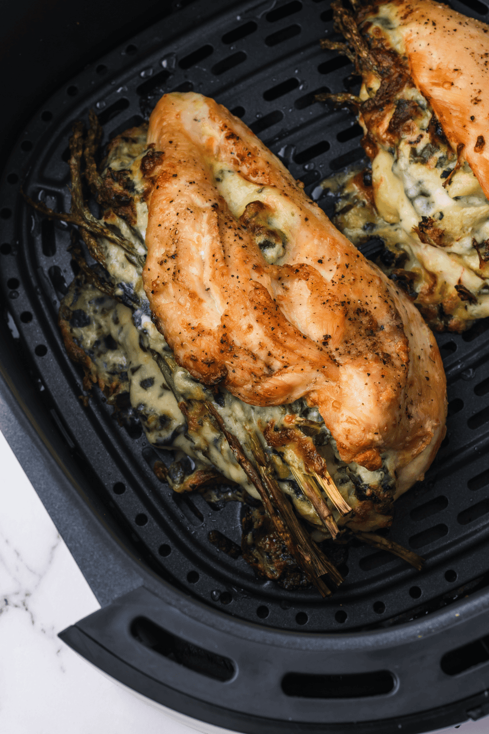 Air Fryer Chicken Stuffed With Artichoke Dip
