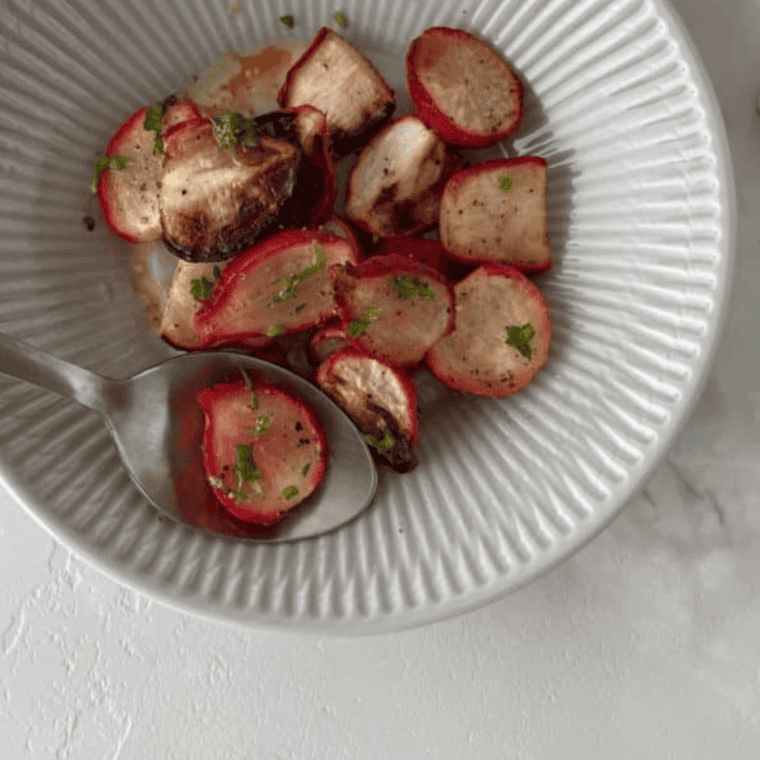 A plate of golden, crispy Air Fryer Roasted Radishes served as a delicious side dish.