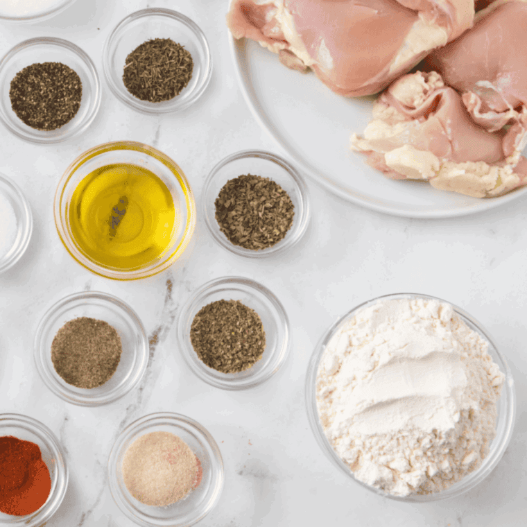Ingredients needed for Bob Evan's Fried Chicken Copycat Recipe on kitchen table.