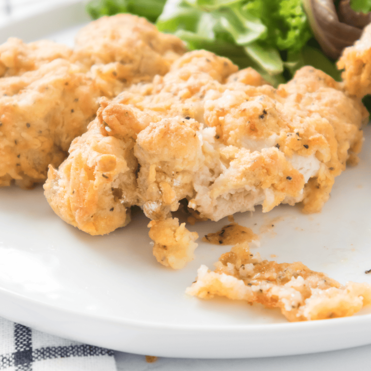 Plate of golden brown crunchy homemade fried chicken like Bob Evan’s.