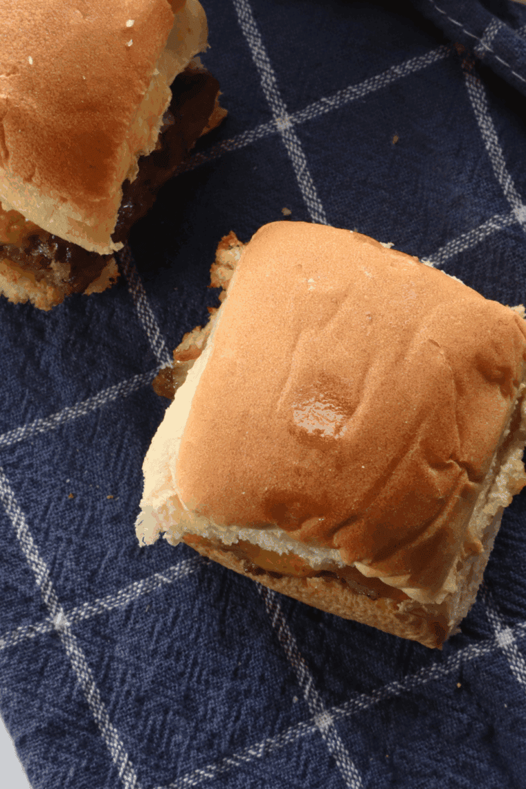 Homemade copycat White Castle sliders with seasoned beef, soft buns, and melted cheese