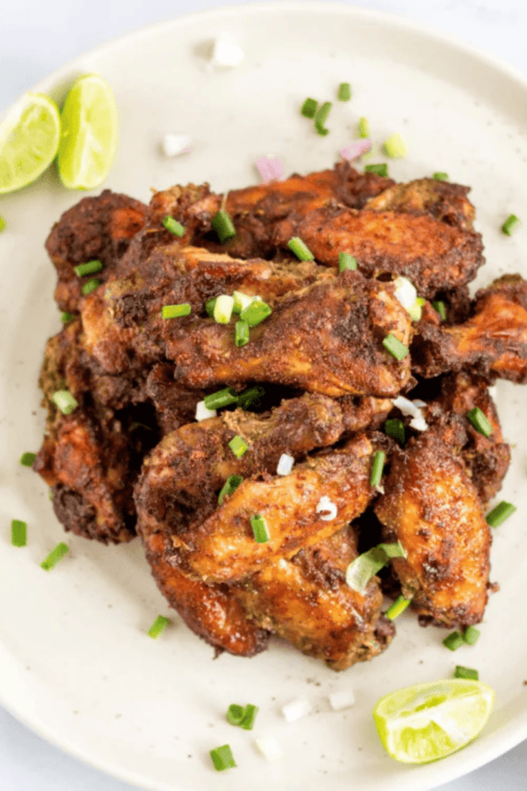 Plate of crispy Cajun-spiced Copycat Wingstop chicken wings, golden brown and ready to serve.