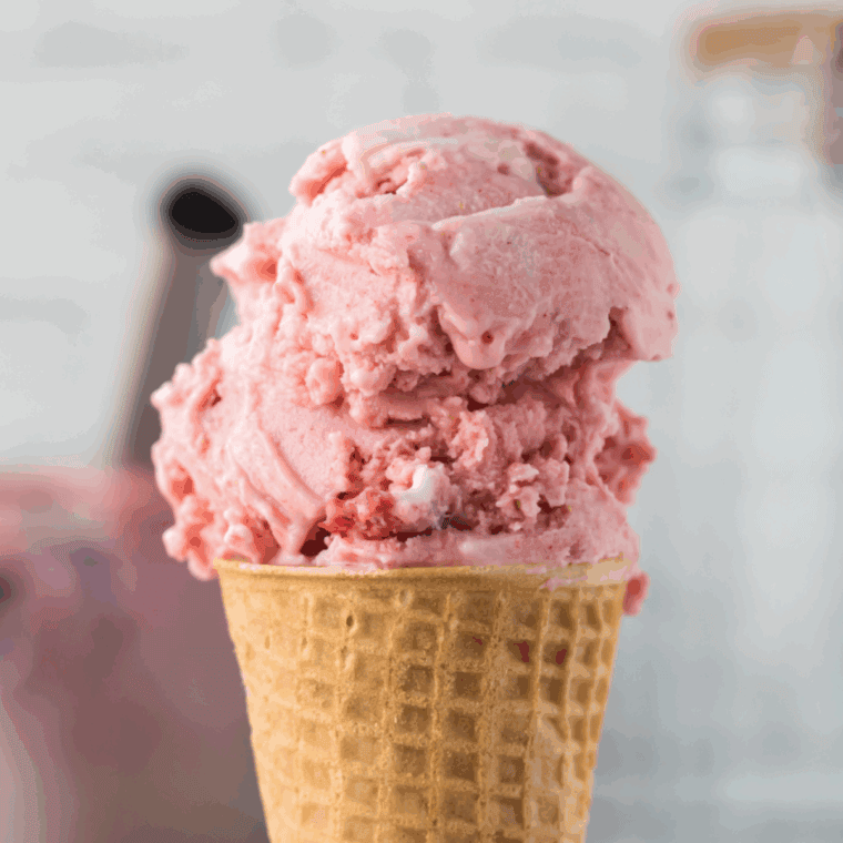 Bowl of creamy strawberry ice cream made with condensed milk in Ninja Creami