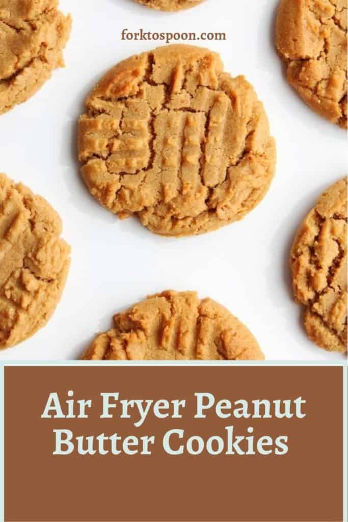 Photo of peanut butter cookies in air fryer with overlay text reading "air fryer peanut butter cookies" 