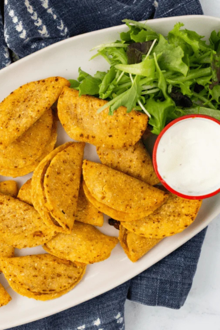 air fryer Trader Joe&rsquo;s mini chicken tacos crispy golden shell served with dipping sauce