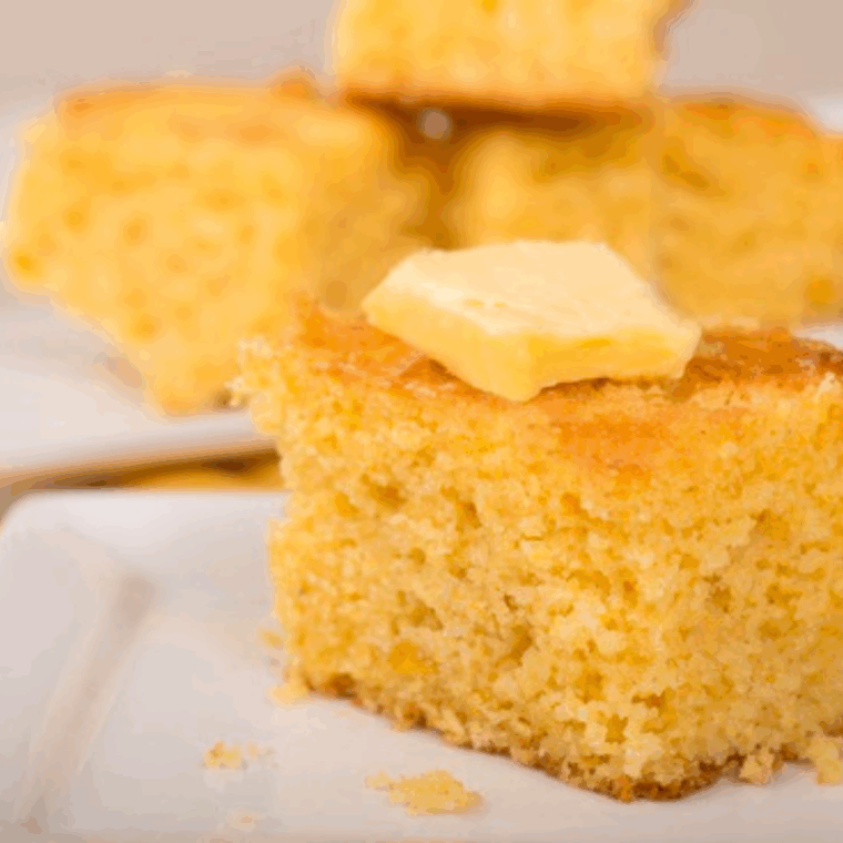 Southern cornbread slices stacked on a plate