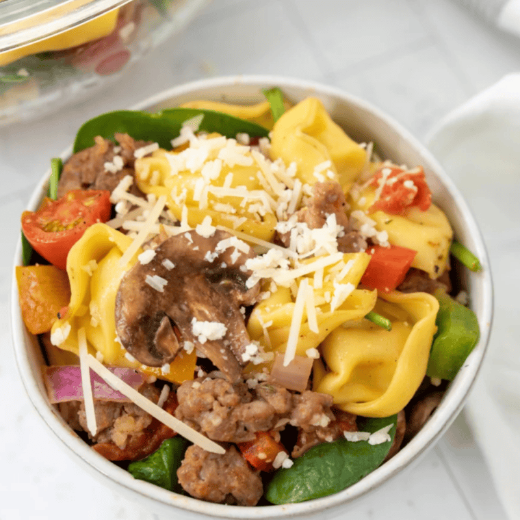 close up crunchy air fried tortellini pasta with parmesan topping