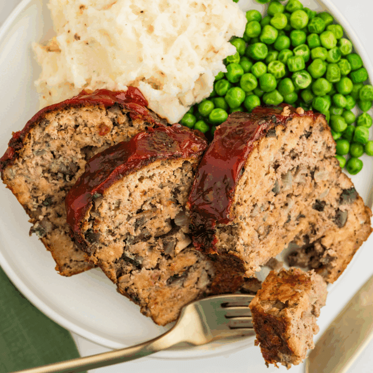 Juicy leftover meatloaf on plate after reheating in air fryer