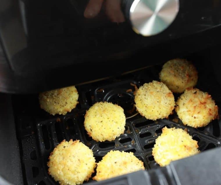 air fried breaded cheese rounds in air fryer basket
