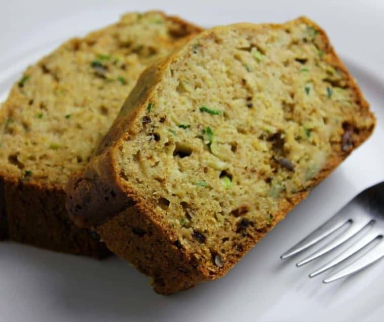 zucchini bread slices on plate with fork