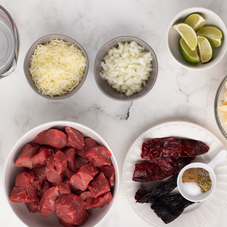 Ingredients needed for Air Fryer Birria Fries on table.