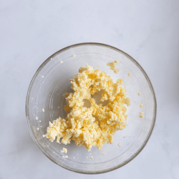 Form the dough for the tag along cookies in a large mixing bowl.
