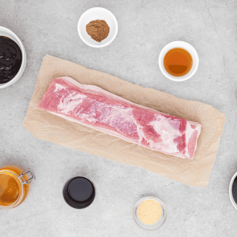 Ingredients Air Fryer Honey Glazed Pork Belly Bites on kitchen table.