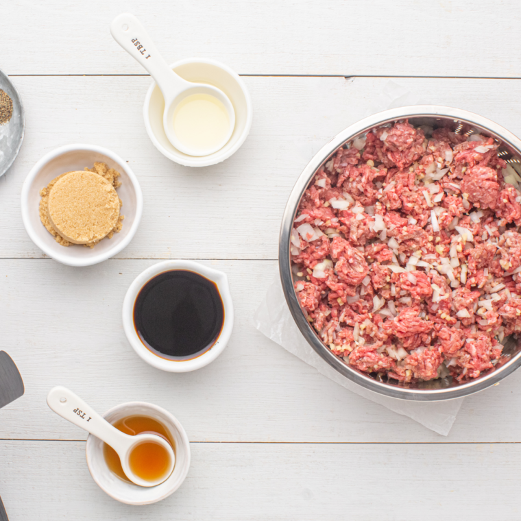 Mixing the ingredients into an air-fryer safe pan.