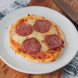 This air fryer pepperoni naan pizza cooks in 8 minutes flat using a 380&deg;F pre-crisp trick that keeps the bottom shatter-crisp instead of soggy. With six pantry ingredients and one piece of naan bread, you get a personal pizza that beats delivery &mdash; every single time.