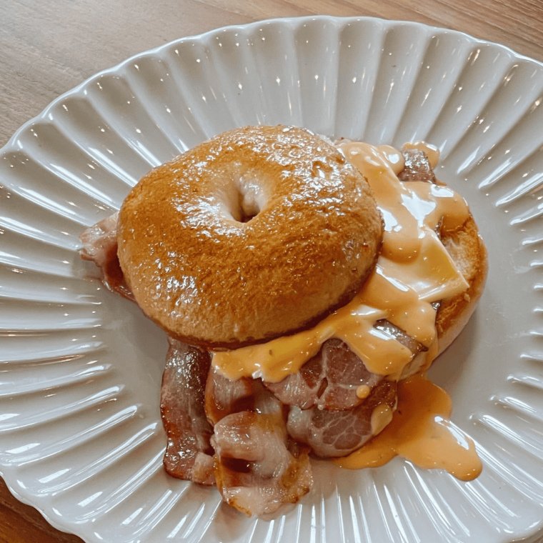 Close-up of dairy-free bagels on a plate, highlighting their texture and appearance