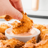 Crispy panko fried shrimp made in the air fryer, served with lemon wedges and cocktail sauce.