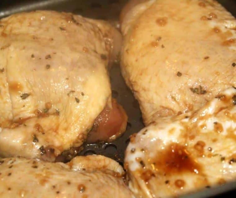 Close up of garlic brown sugar chicken thighs before cooking. 