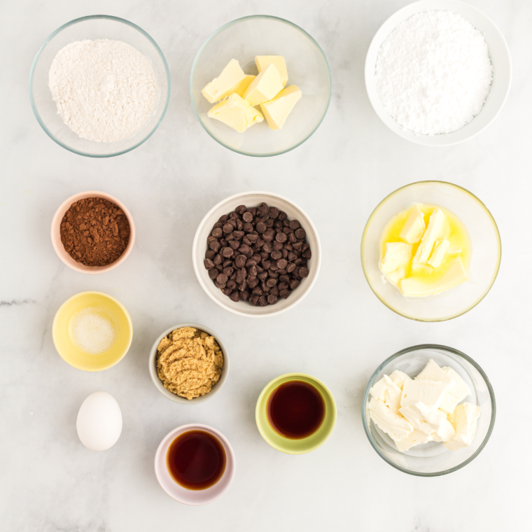 Ingredients for air fryer brownie pizza arranged on a marble table