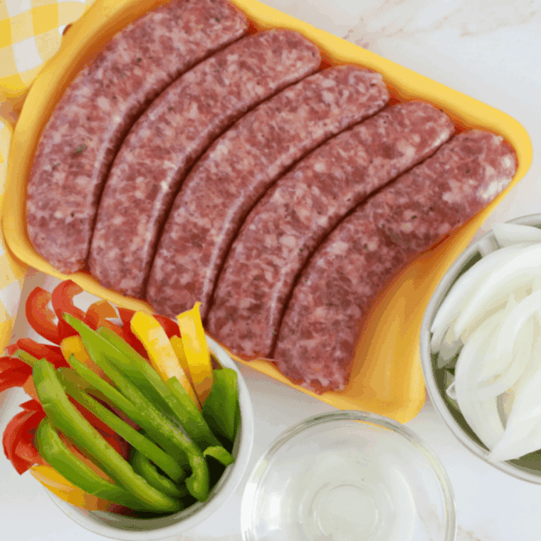 Ingredients needed for Air Fryer Frozen Italian Sausage on kitchen table.