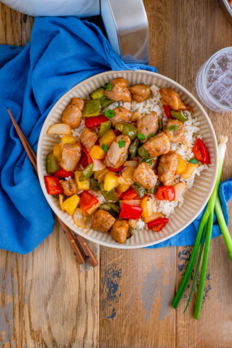 "Air Fryer Peppers and Onions in a colorful presentation."