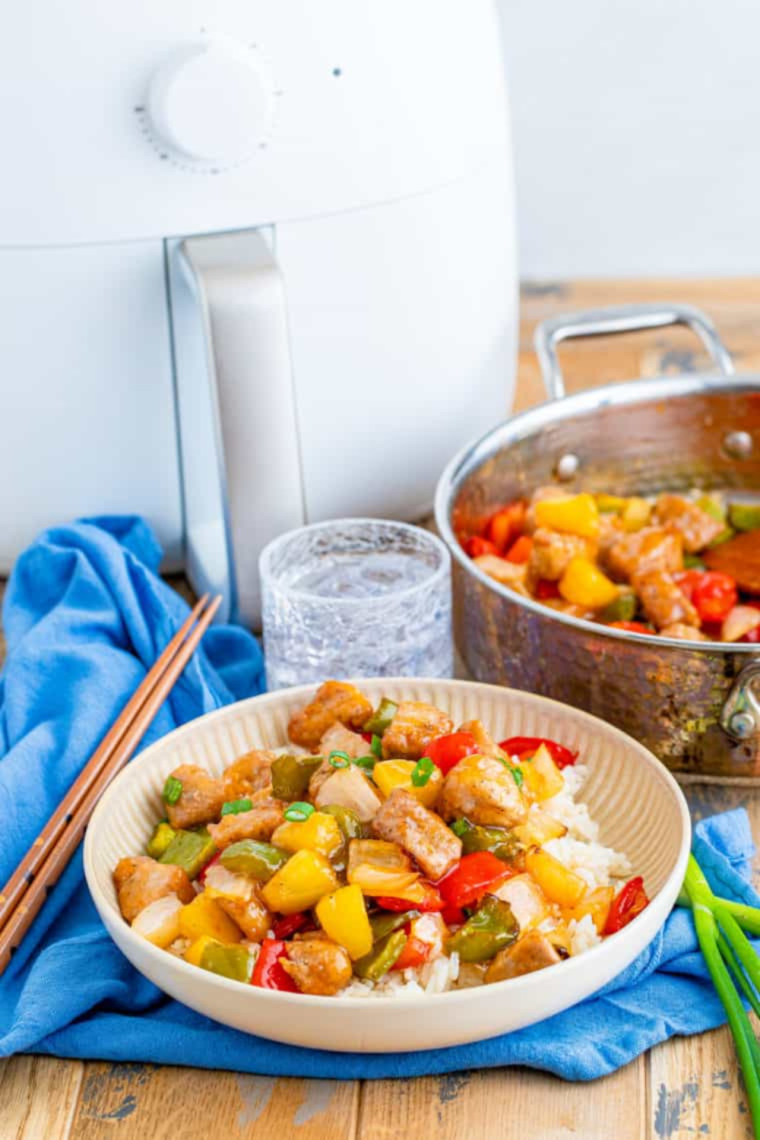 Air Fryer Pork Stir Fry with crispy pork and colorful vegetables in a savory sauce.