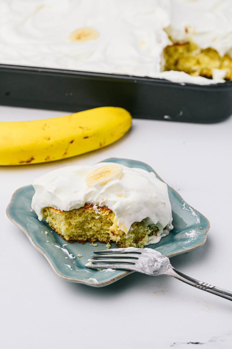 "Close-up of Air Fryer Banana Poke Cake with creamy filling and banana flavor"