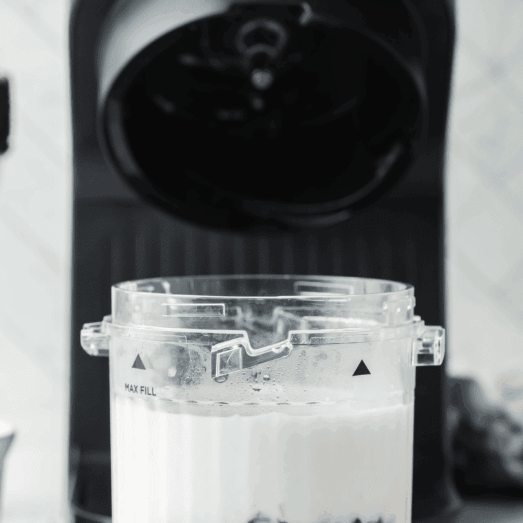 Milk, ice cream and crushed oreos in the ninja pint container.