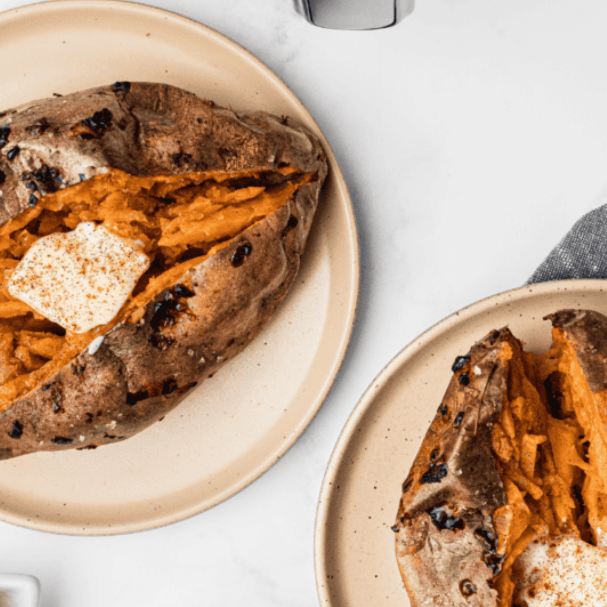 Ninja Foodi Baked Sweet Potato served as a delicious side dish, showcasing a perfectly cooked and tender texture.