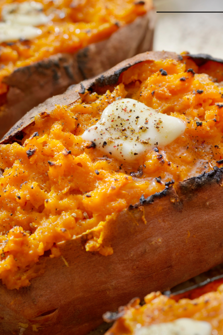 Ninja Foodi Baked Sweet Potato, perfectly cooked with a crispy skin and soft, fluffy interior.