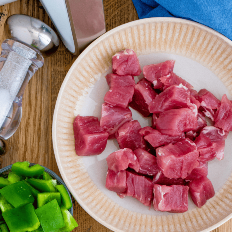 Marinate sliced pork tenderloin with soy sauce, honey, garlic, and ginger to infuse flavors before cooking.