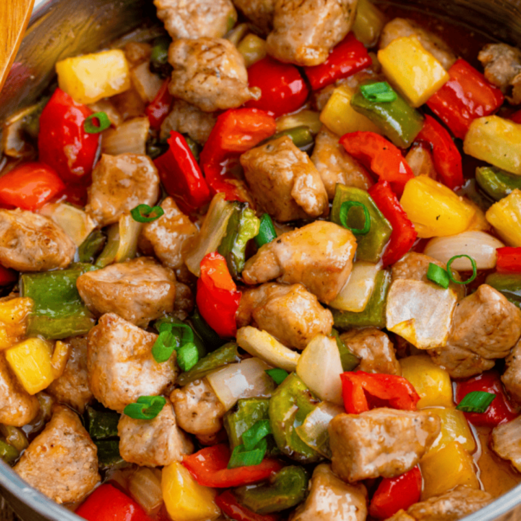 Air Fryer Pork Stir Fry with tender pork, fresh vegetables, and a savory sauce, cooked to perfection.