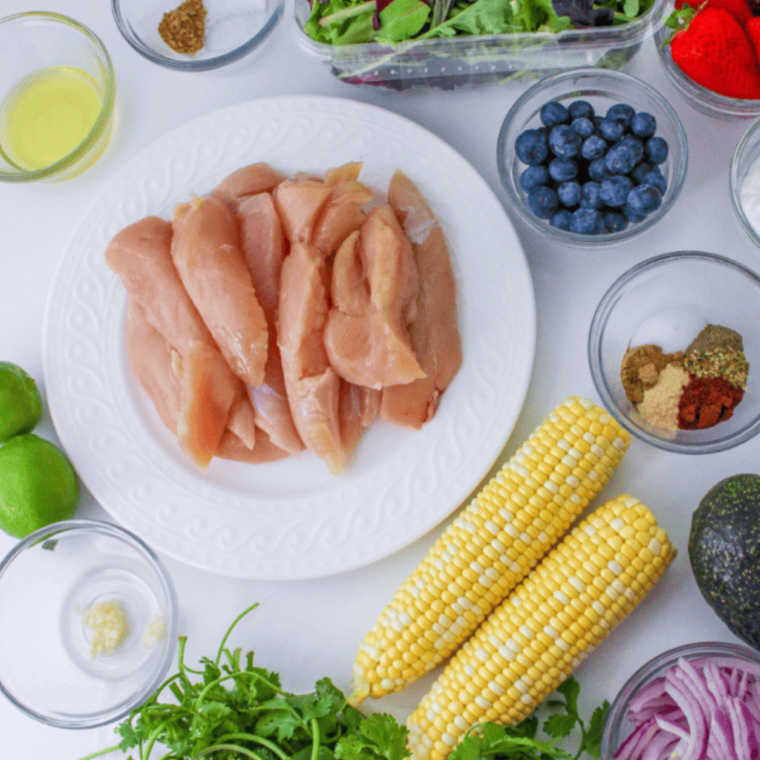 Ingredients for Air Fryer Blackened Chicken Tenders on kitchen table.