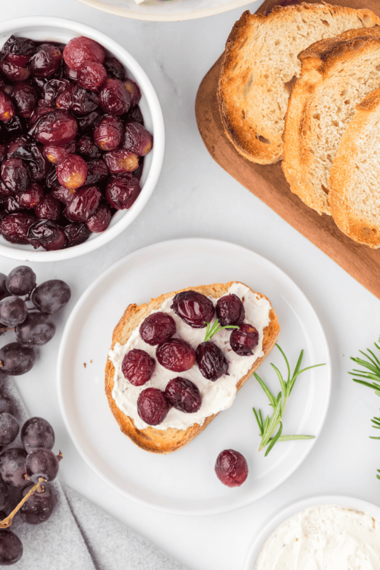 Air fryer basket filled with freshly cooked grapes, crispy and golden brown, ready to be enjoyed as a snack.