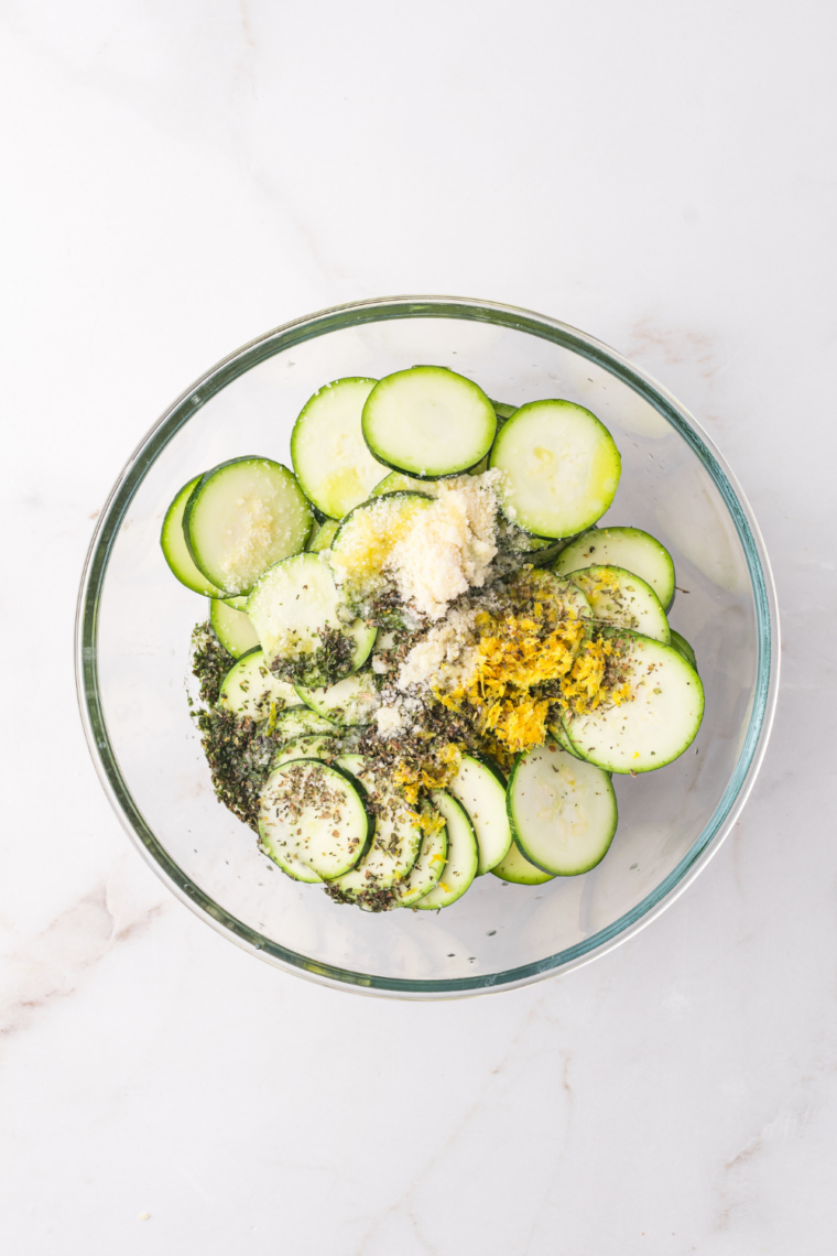 Sliced zucchini grilled on Blackstone until browned and slightly charred with soft centers for fast healthy side