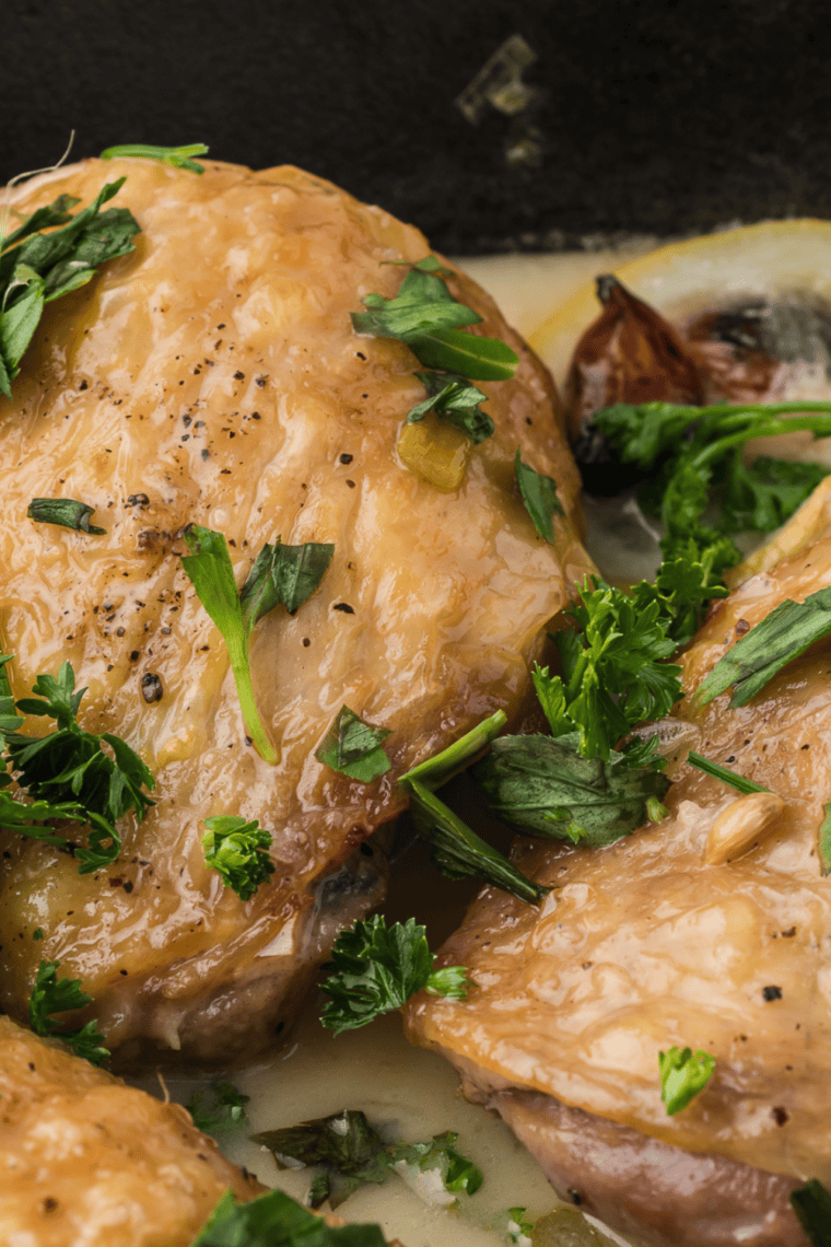 Seasoned bone-in chicken thighs ready to cook on Ninja Foodi Grill.