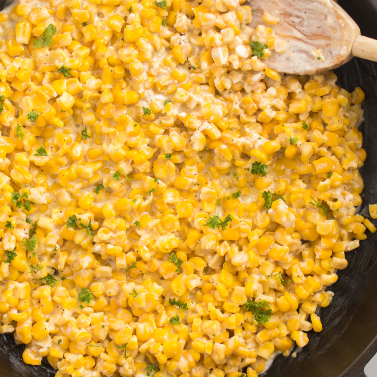 Air Fryer Canned Corn cooked to crispy perfection, seasoned with butter, garlic powder, salt, and pepper.