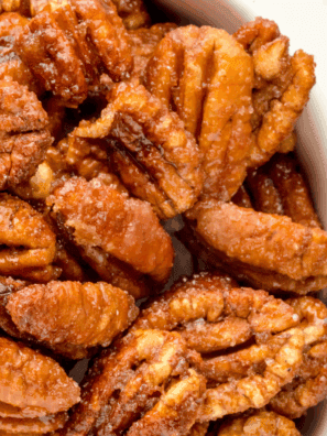 Air fryer gingerbread candied pecans coated in warm holiday spices.