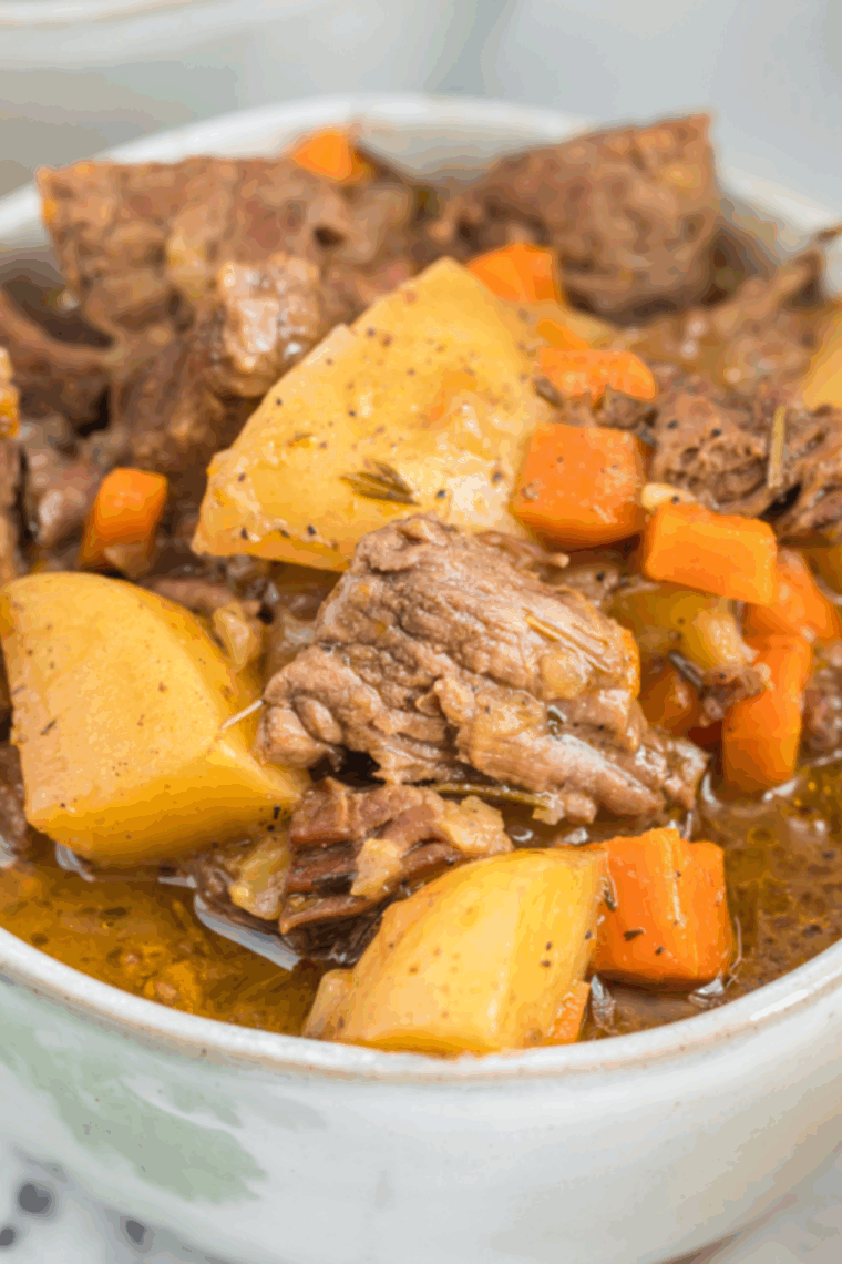 Hearty bowl of Copycat Cracker Barrel beef stew with vegetables and gravy.
