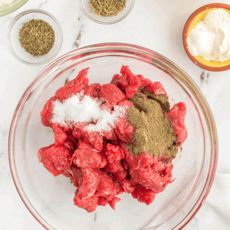 Season the beef with salt and black pepper.
