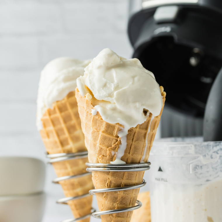 "Ninja Creami Vanilla Soft Serve in a bowl with a spoon."