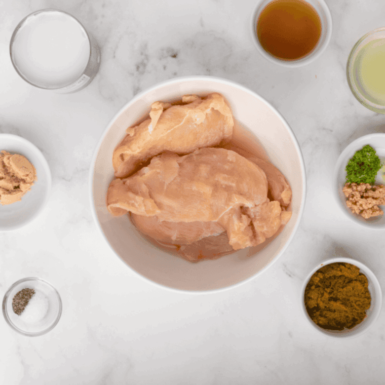 Ingredients needed for Thai Coconut Lime Chicken Cheesecake Factory on kitchen table.