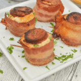 Air Fryer Pig Shots made with bacon-wrapped sausage cups filled with a creamy seasoned mixture.