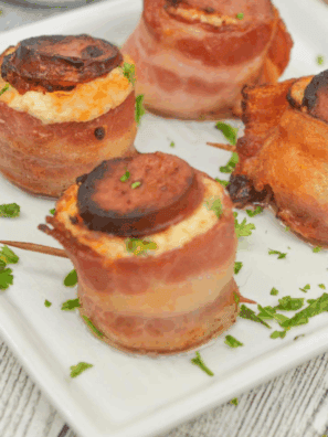 Air Fryer Pig Shots made with bacon-wrapped sausage cups filled with a creamy seasoned mixture.