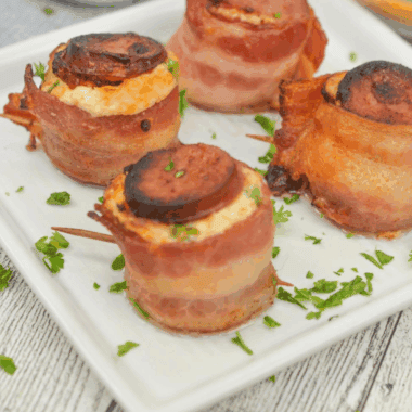 Air Fryer Pig Shots made with bacon-wrapped sausage cups filled with a creamy seasoned mixture.