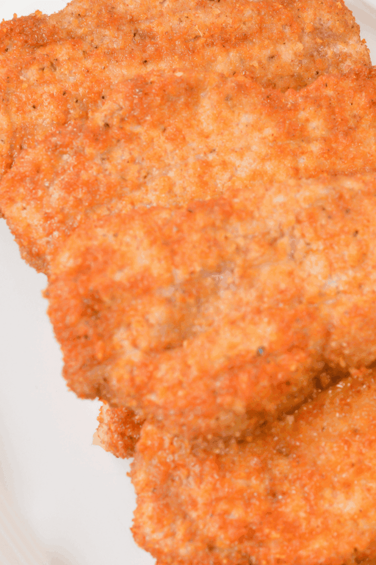 Golden brown Bob Evans-style pork chops served with fresh sides.