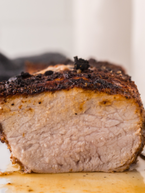 Juicy, sliced pork tenderloin cooked in a Ninja Foodi, ready to serve