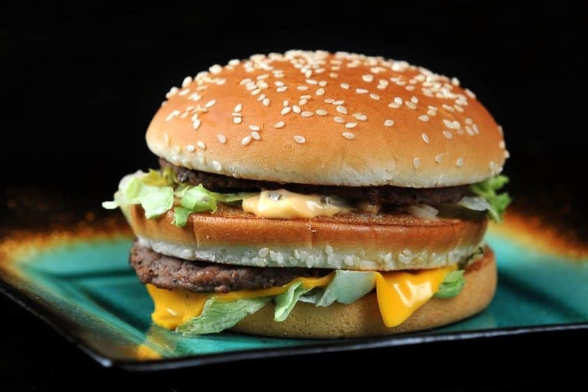 A homemade Big Mac on a plate.
